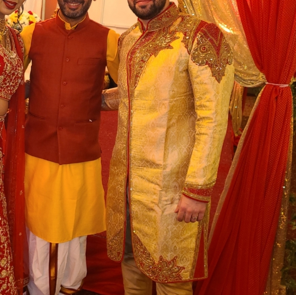 Light gold and red sherwani